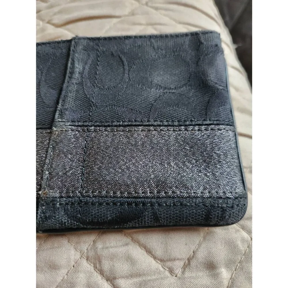 Coach black Signature Jacquard small Zip Wristlet with 65th anniversary lining